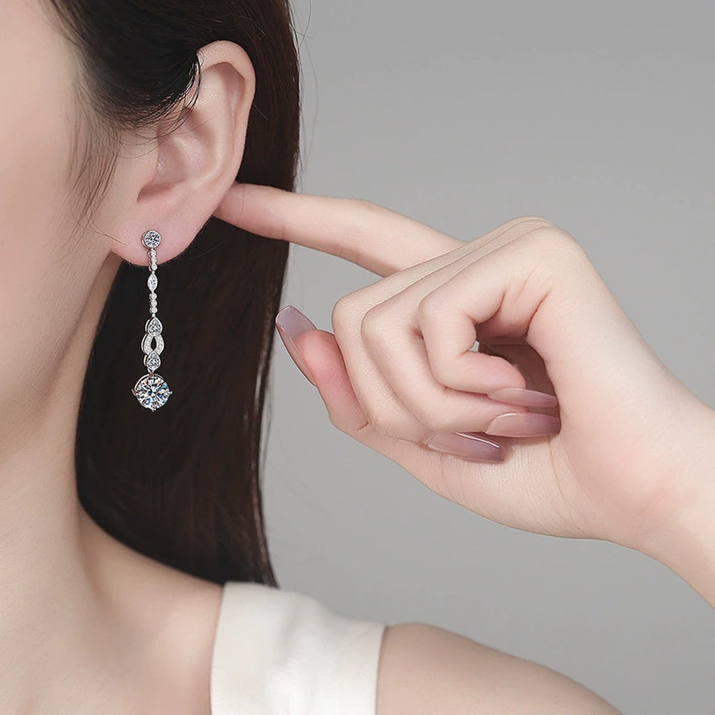 Round Moissanite Stud Dangle Earrings with CZ in Rhodium-Plated S925 sterling silver worn on ear by model showing scale, placement, and stud dangle earrings styling