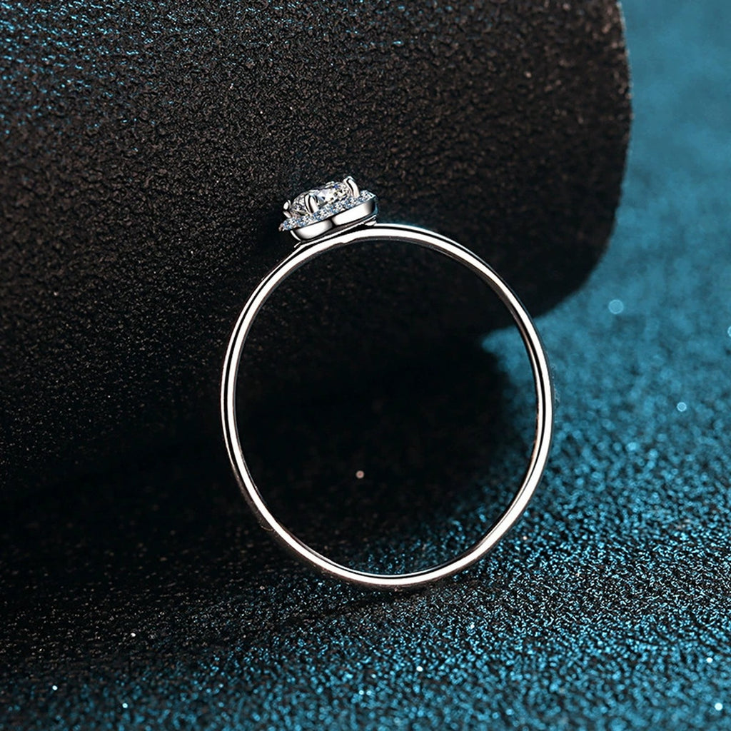 Round Moissanite Halo Ring with CZ product view showing moissanite setting and metal finish