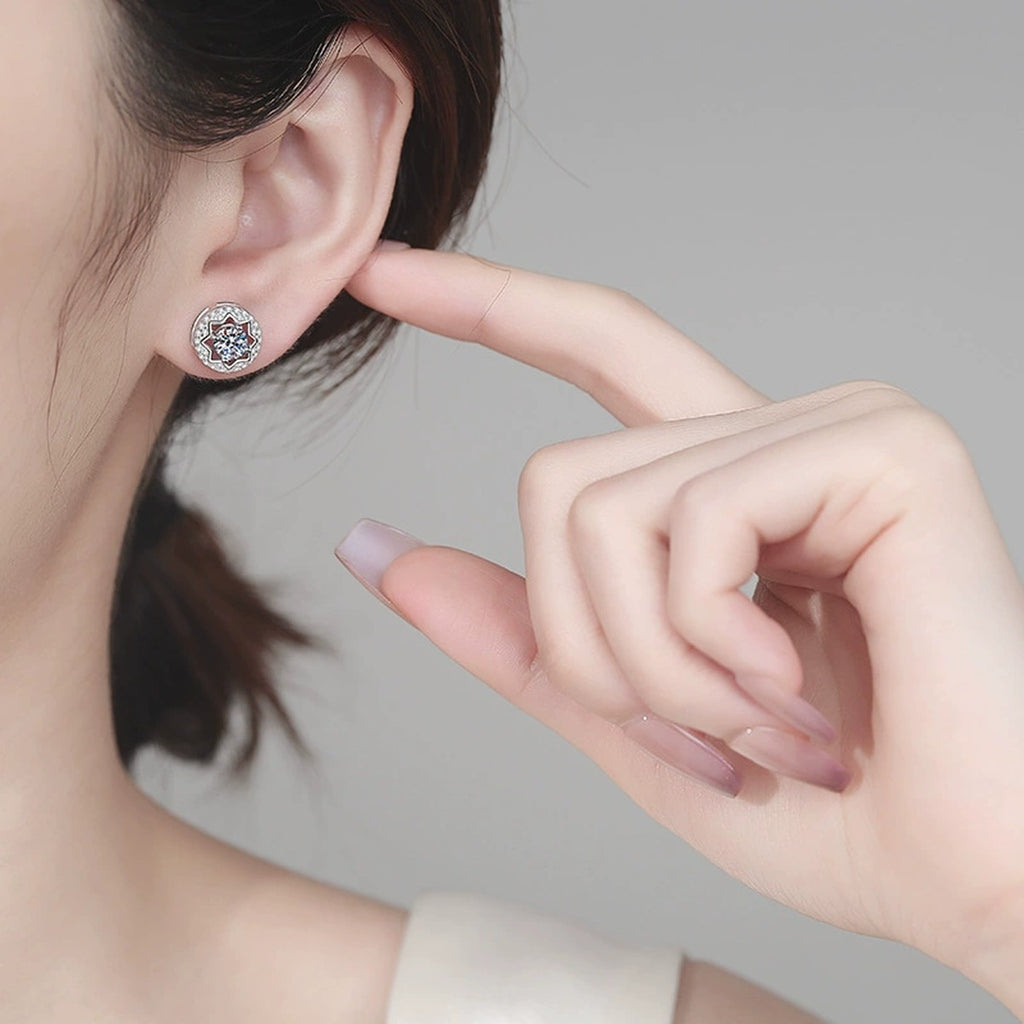 Round Halo Moissanite Stud Earrings with CZ in Rhodium-Plated S925 sterling silver worn on ear by model showing scale, placement, and stud earrings styling
