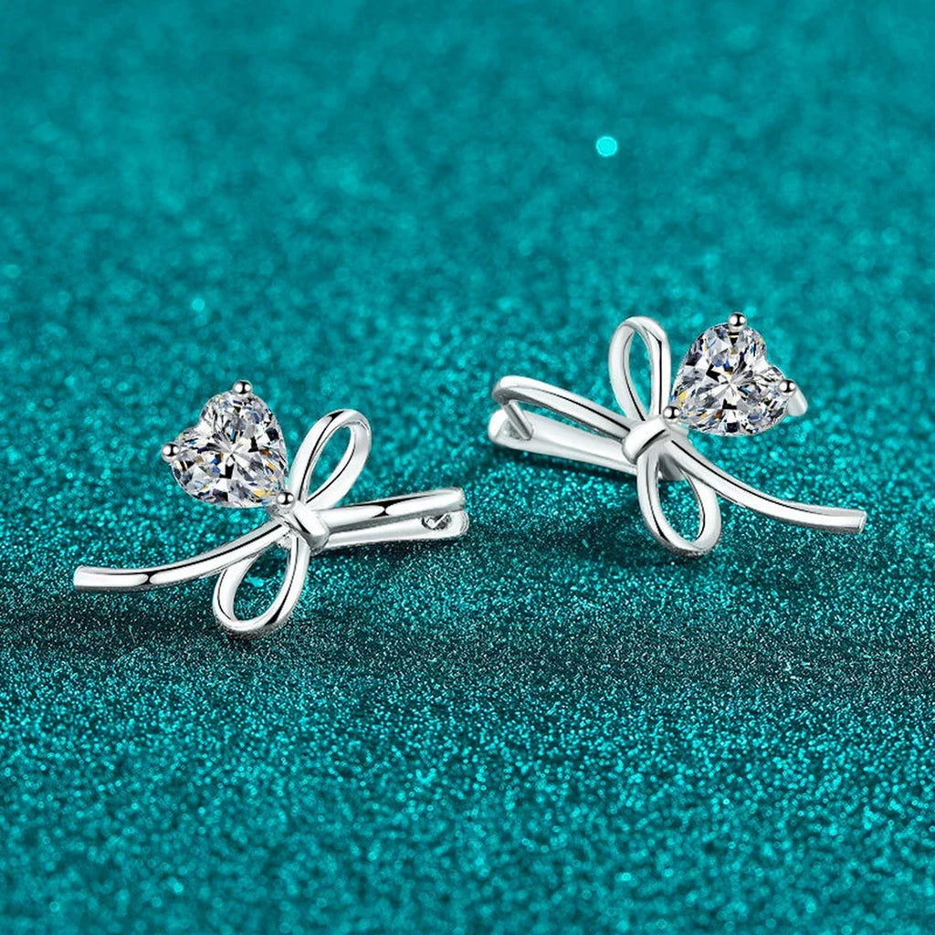 Heart Moissanite Bow Hoop Drop Earrings in Rhodium-Plated S925 sterling silver product scene view showing front sparkle