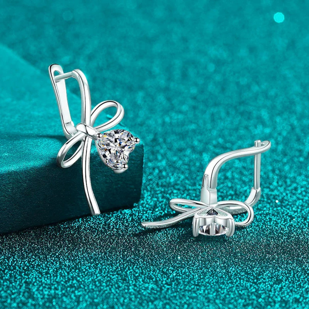 Heart Moissanite Bow Hoop Drop Earrings in Rhodium-Plated S925 sterling silver product scene view showing side profile