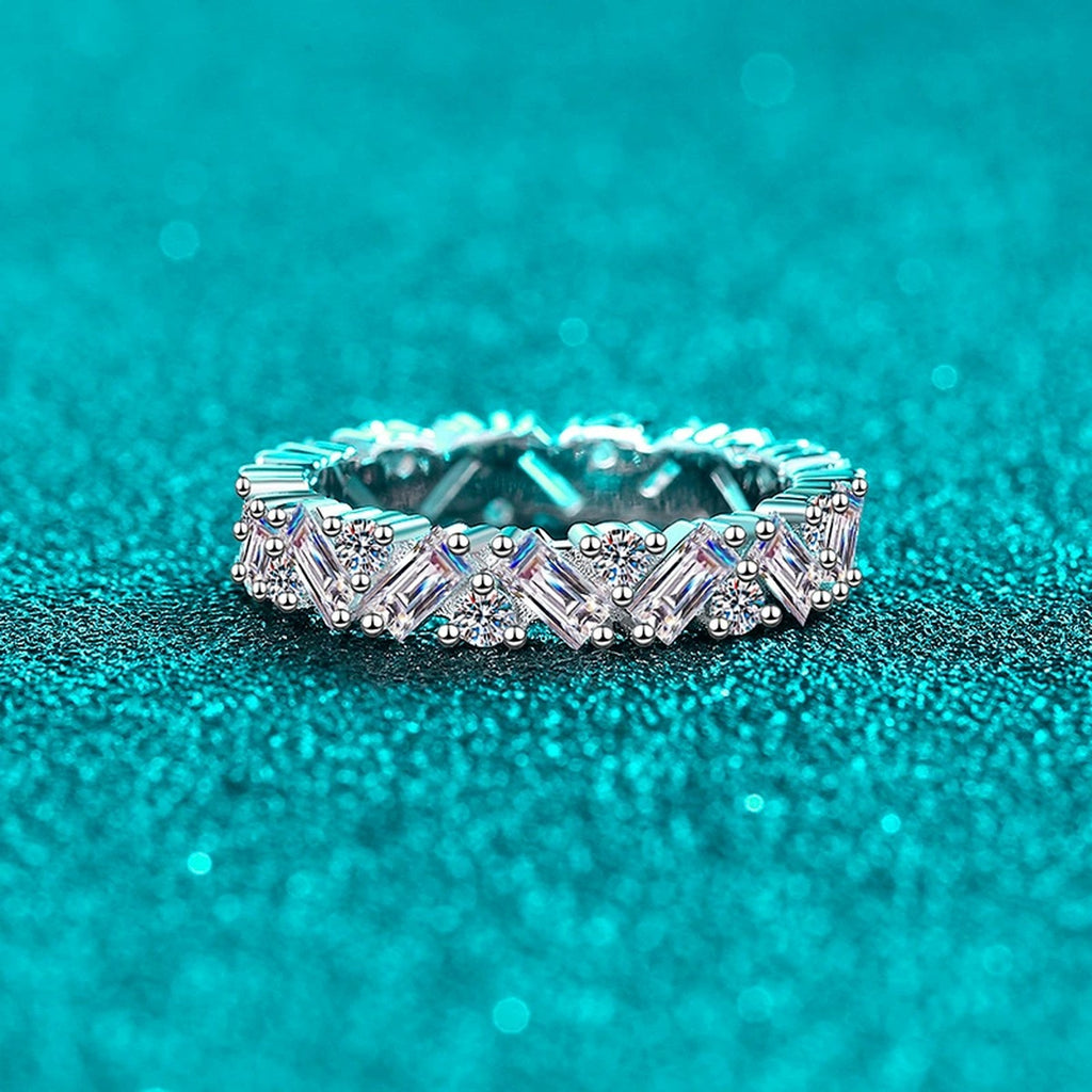 Emerald and Round Moissanite Band Ring product view showing moissanite setting and metal finish