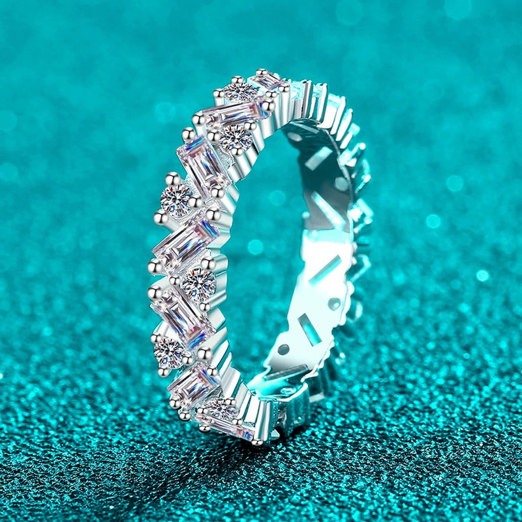Emerald and Round Moissanite Band Ring product view showing moissanite setting and metal finish
