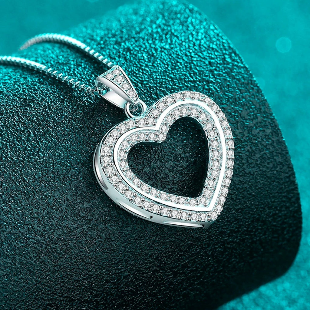 Open Heart Moissanite Pendant Necklace in Rhodium-Plated S925 sterling silver close-up product scene showing pendant setting
