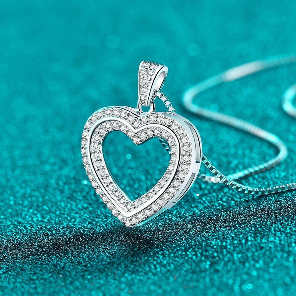 Open Heart Moissanite Pendant Necklace in Rhodium-Plated S925 sterling silver blue display scene showing chain and stone layout