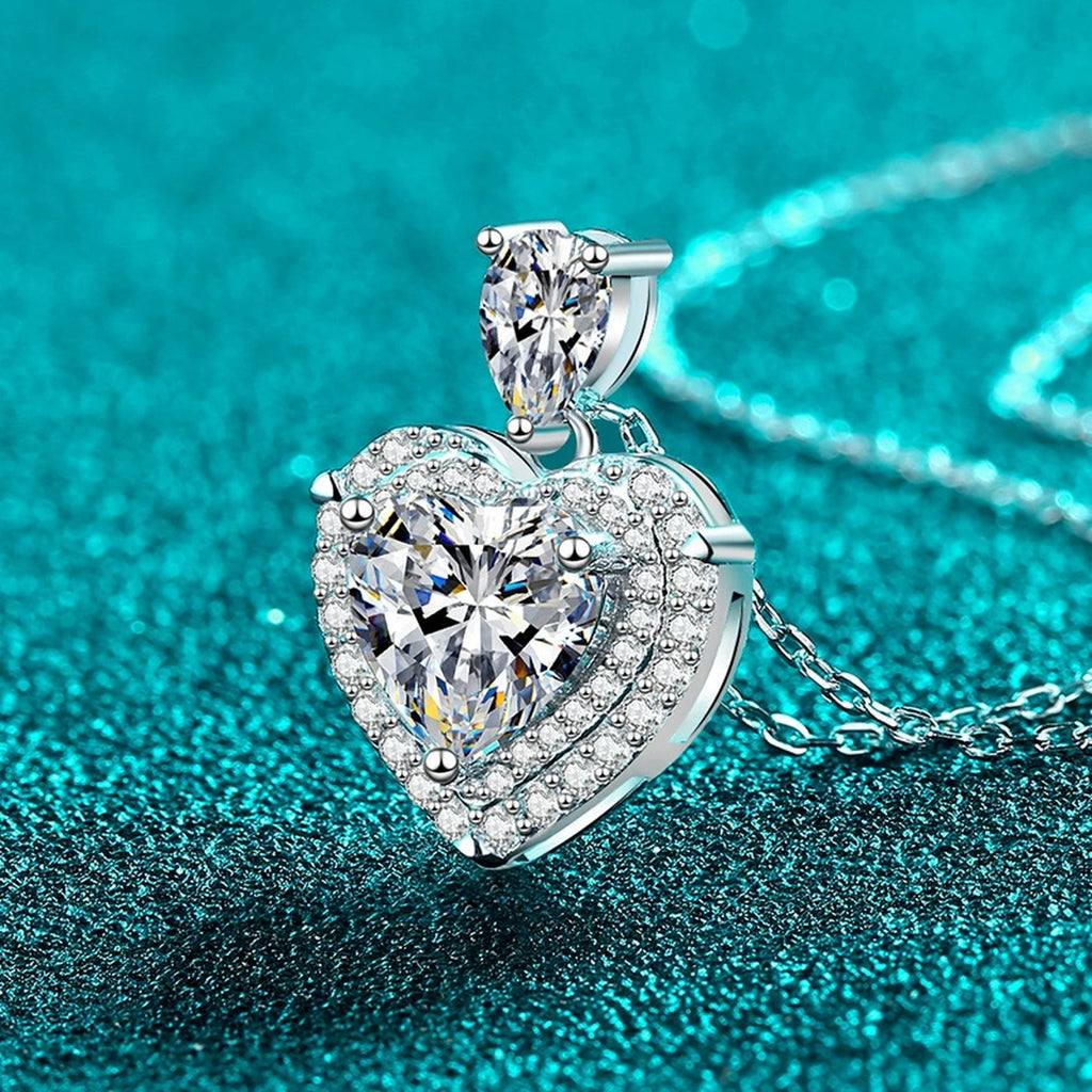 Pear and Heart Moissanite Pendant Necklace with CZ in Rhodium-Plated S925 sterling silver blue display scene showing chain and stone layout