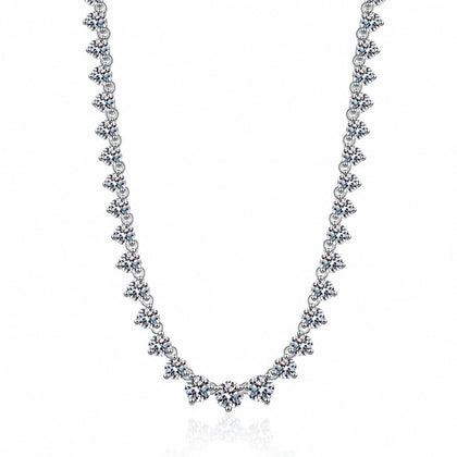 Tennis Moissanite Necklace in Rhodium-Plated S925 sterling silver white background product photo showing graduated tennis necklace with round moissanite stations across the neckline