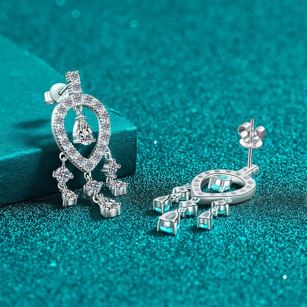 Pear and Round Moissanite Stud Chandelier Earrings in Rhodium-Plated S925 sterling silver product scene view showing front sparkle