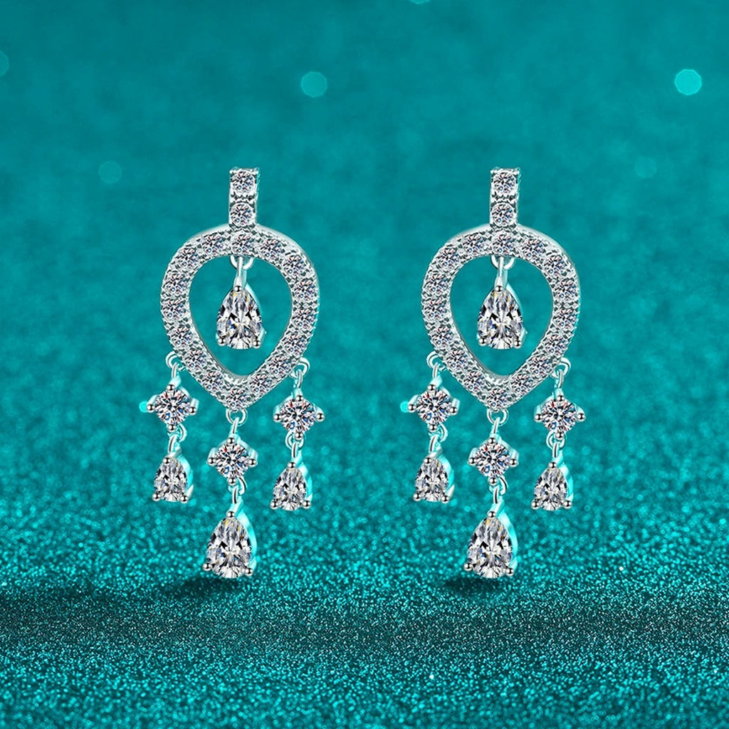 Pear and Round Moissanite Stud Chandelier Earrings in Rhodium-Plated S925 sterling silver product scene view showing angled setting detail