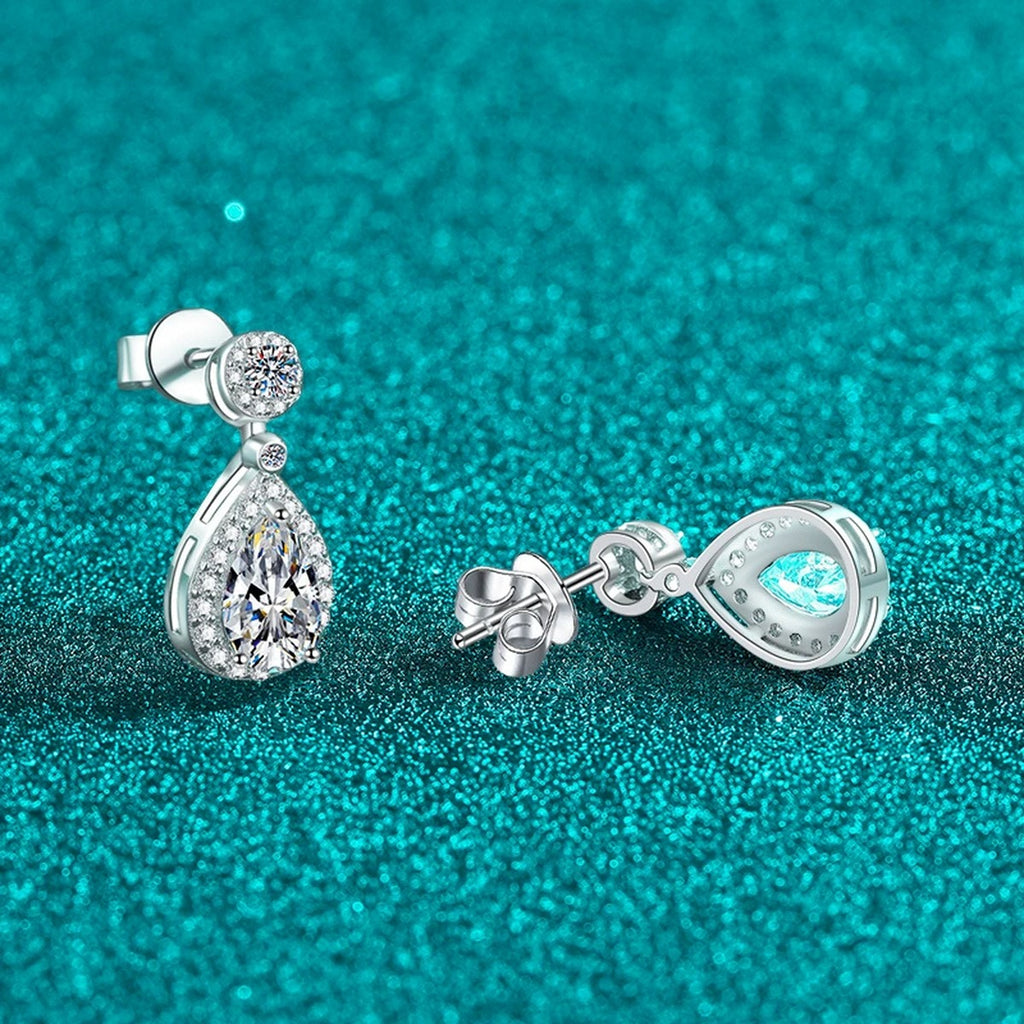 Pear Cut Moissanite Stud Drop Earrings with CZ in Rhodium-Plated S925 sterling silver product scene view showing angled setting detail