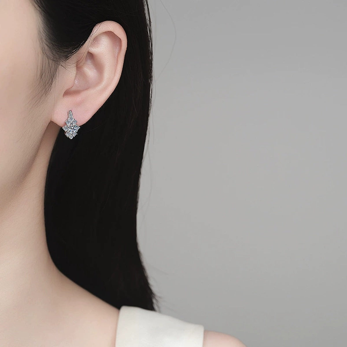 Round Moissanite Hoop Earrings with CZ in Rhodium-Plated S925 sterling silver worn on ear by model showing scale, placement, and hoop earrings styling