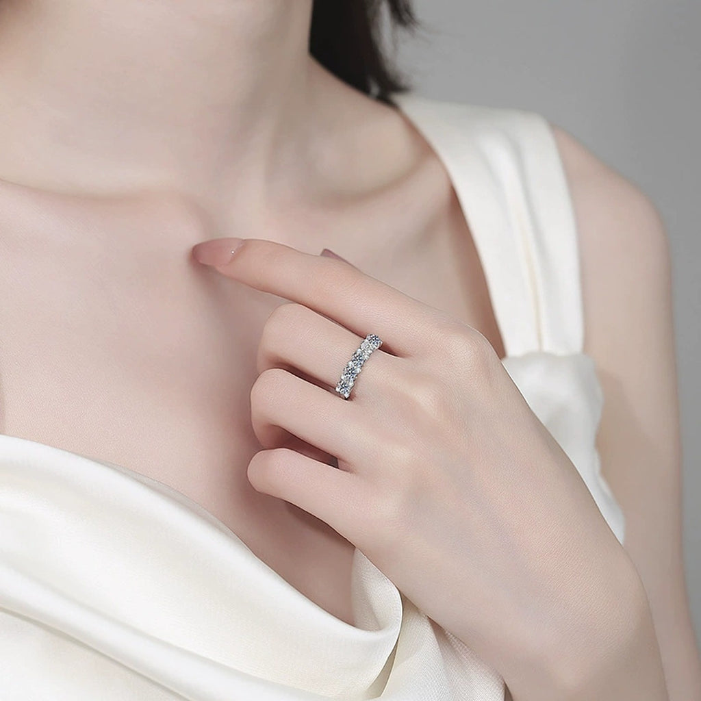 Oval and Round Moissanite Band Ring worn on hand to show scale, band width, and ring profile