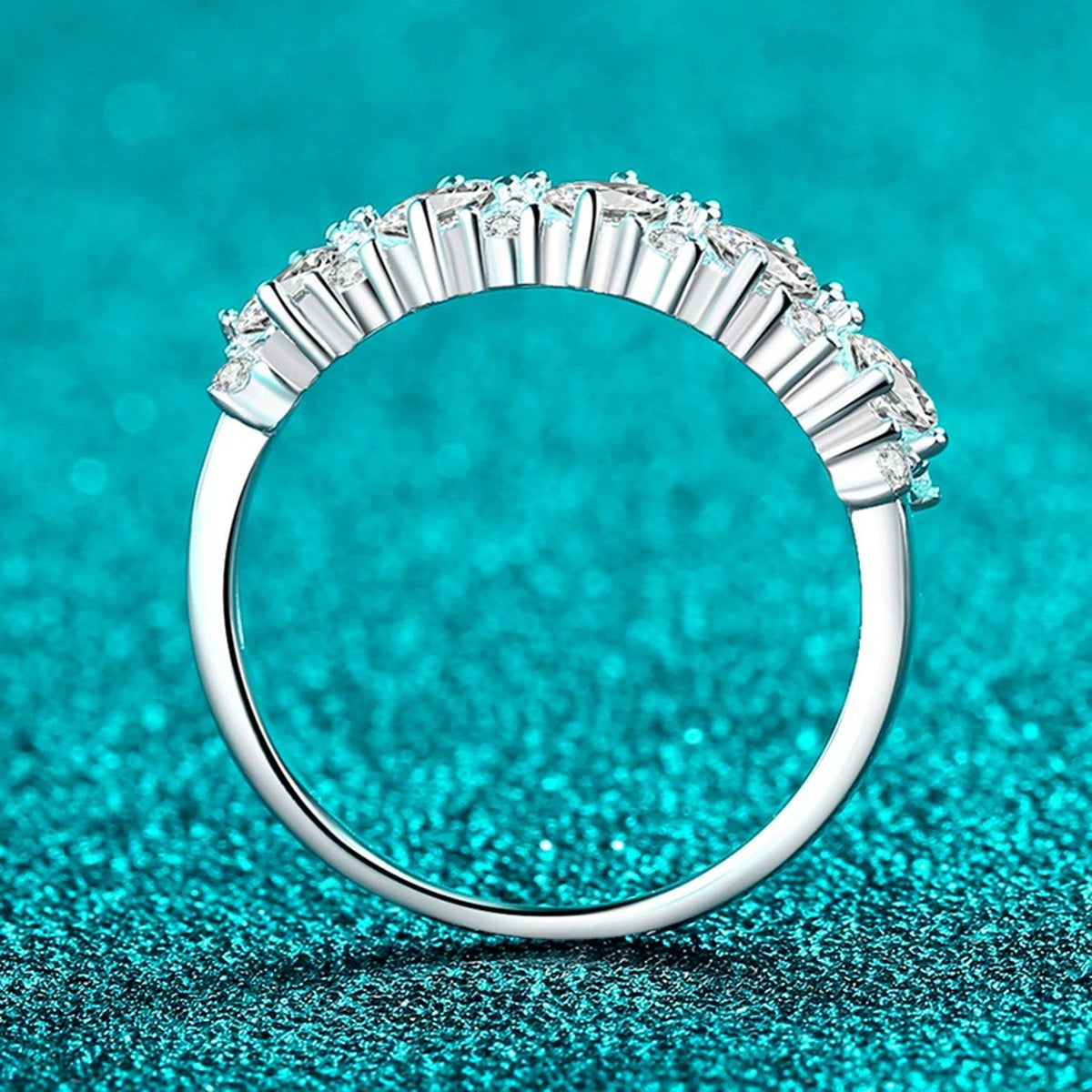 Oval and Round Moissanite Band Ring product view showing moissanite setting and metal finish