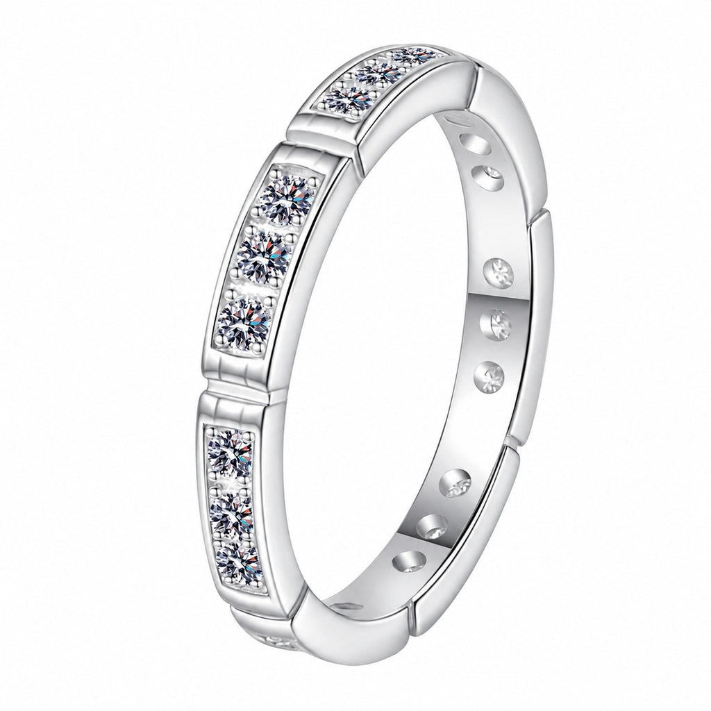 Round Moissanite Band Ring in rhodium-plated S925 sterling silver on clean white background