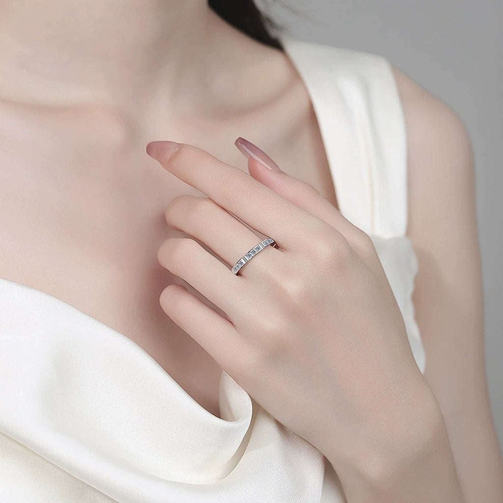 Round Moissanite Band Ring worn on hand to show scale, band width, and ring profile