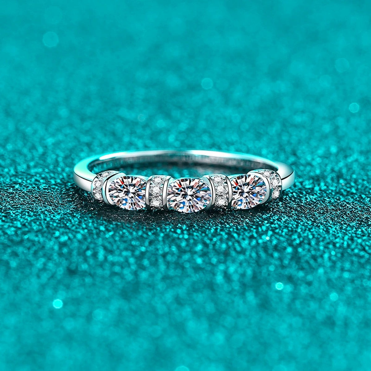 Oval and Round Moissanite Band Ring product view showing moissanite setting and metal finish