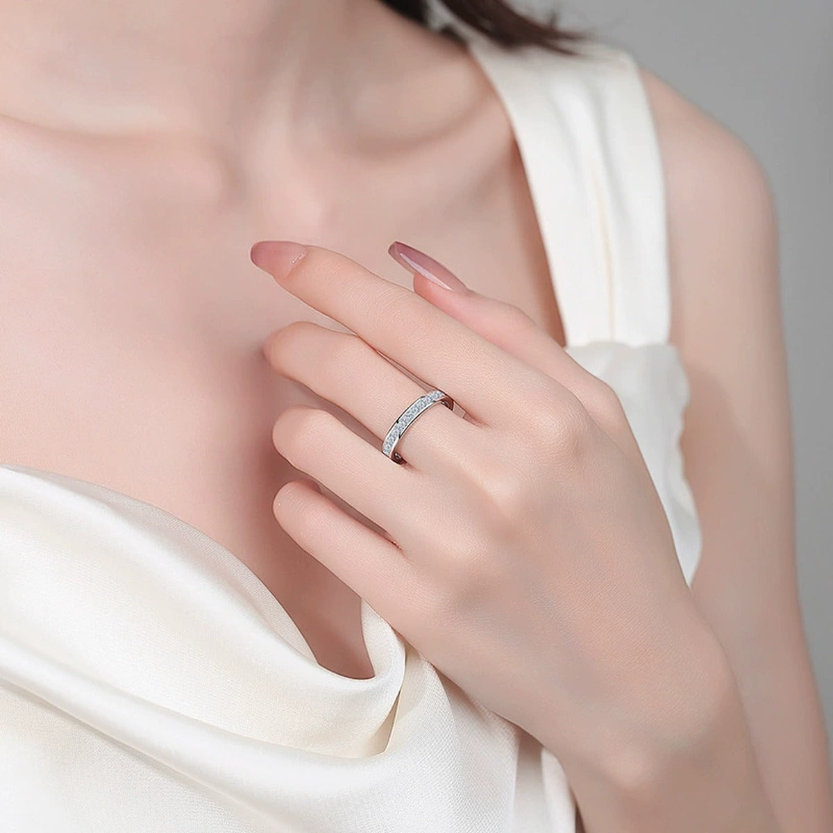 Princess Cut Moissanite Band Ring worn on hand to show scale, band width, and ring profile