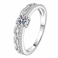 Round Moissanite Statement Ring in rhodium-plated S925 sterling silver on clean white background