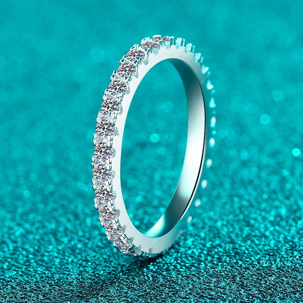 Round Moissanite Band Ring product view showing moissanite setting and metal finish