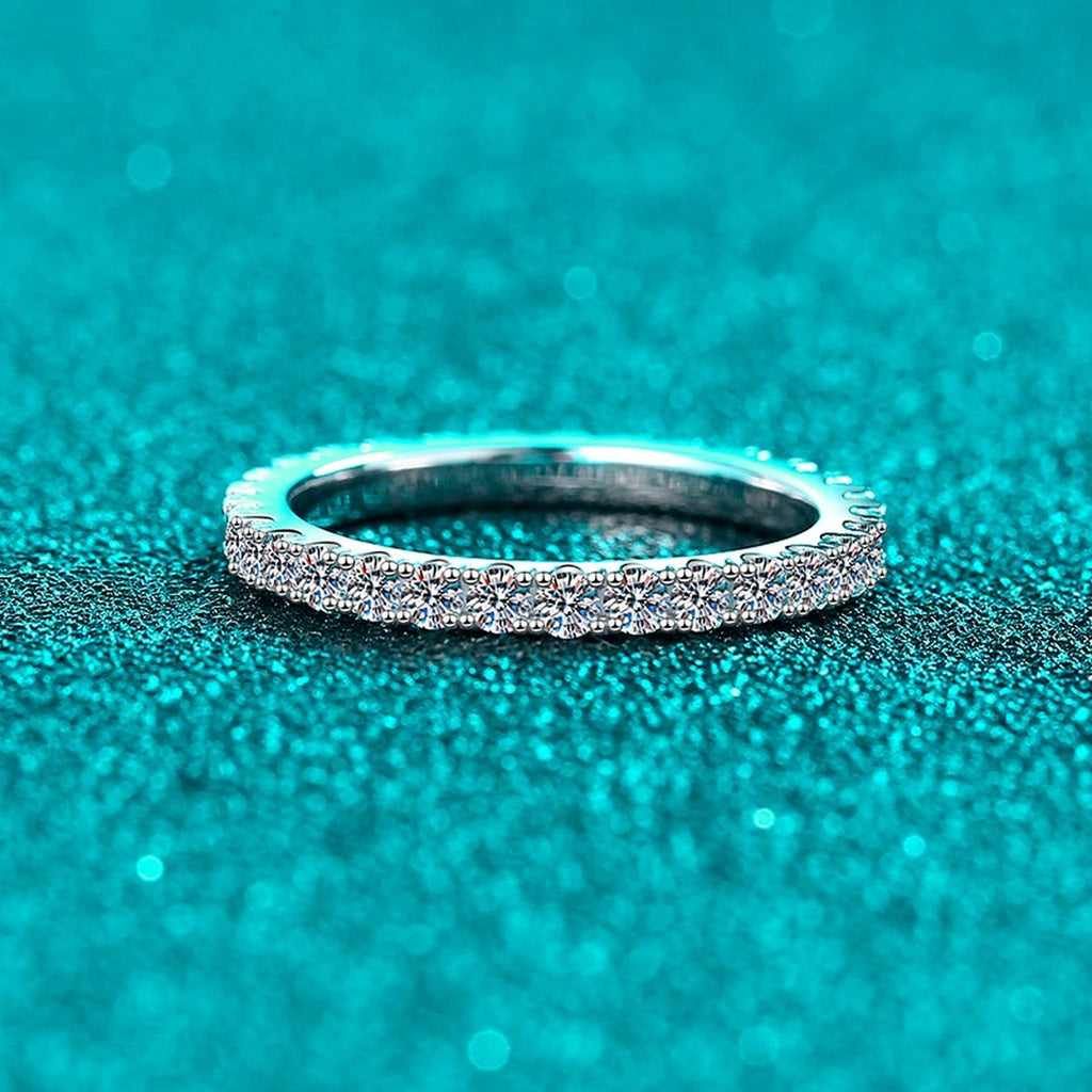 Round Moissanite Band Ring product view showing moissanite setting and metal finish