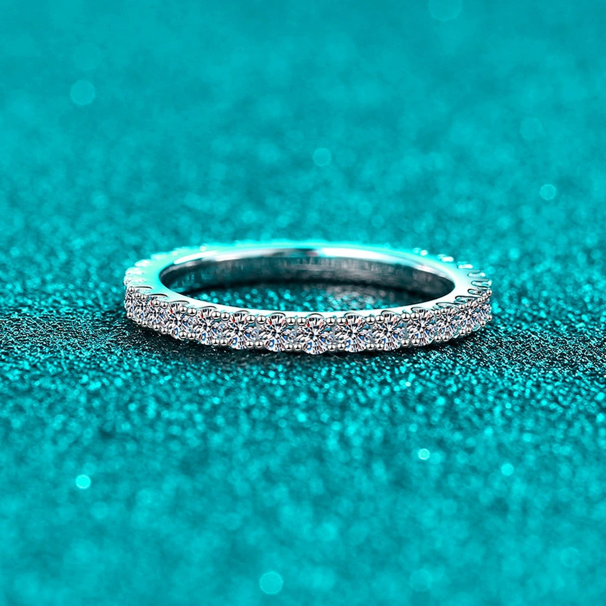 Round Moissanite Band Ring product view showing moissanite setting and metal finish
