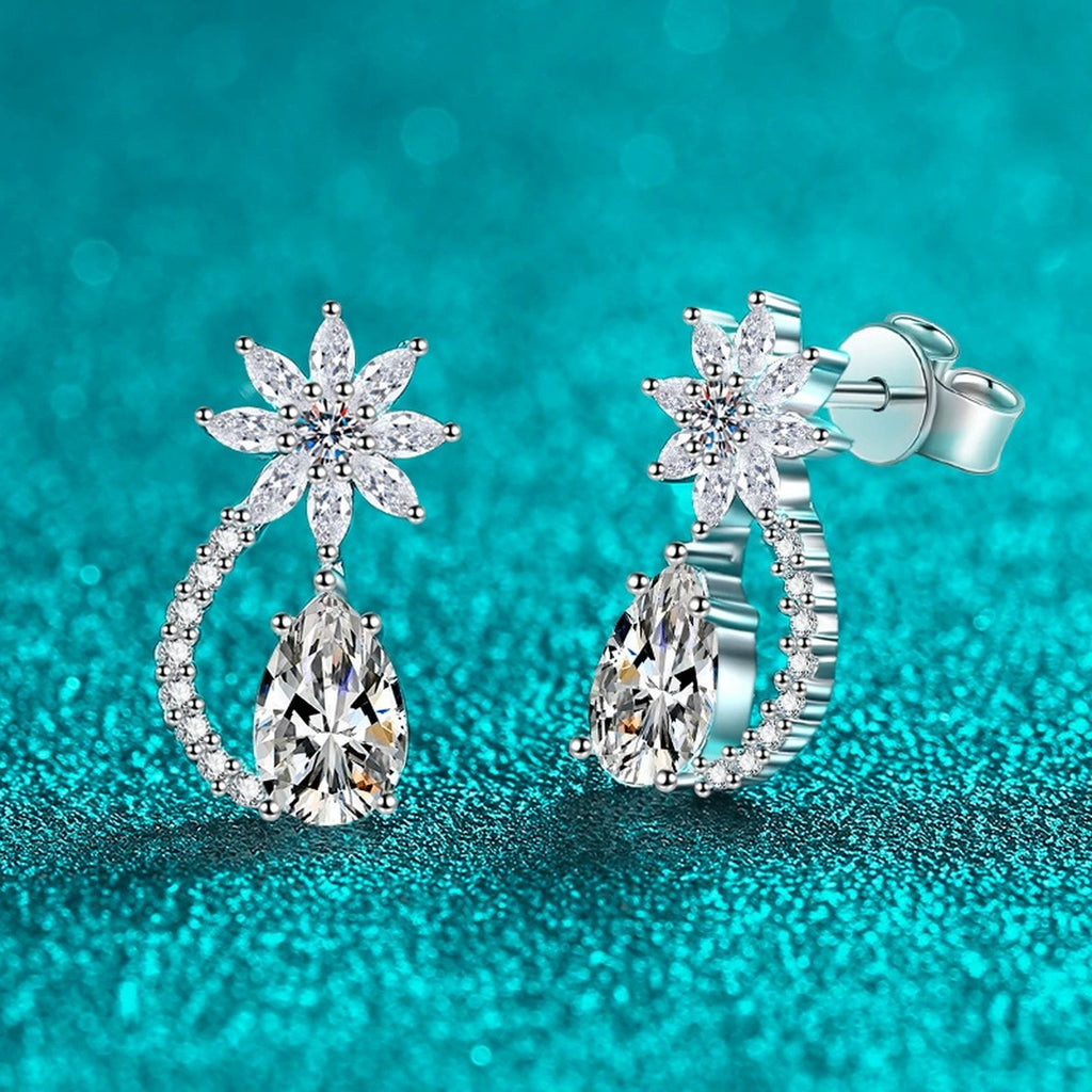 Pear Cut Moissanite Stud Drop Earrings with CZ in Rhodium-Plated S925 sterling silver product scene view showing front sparkle