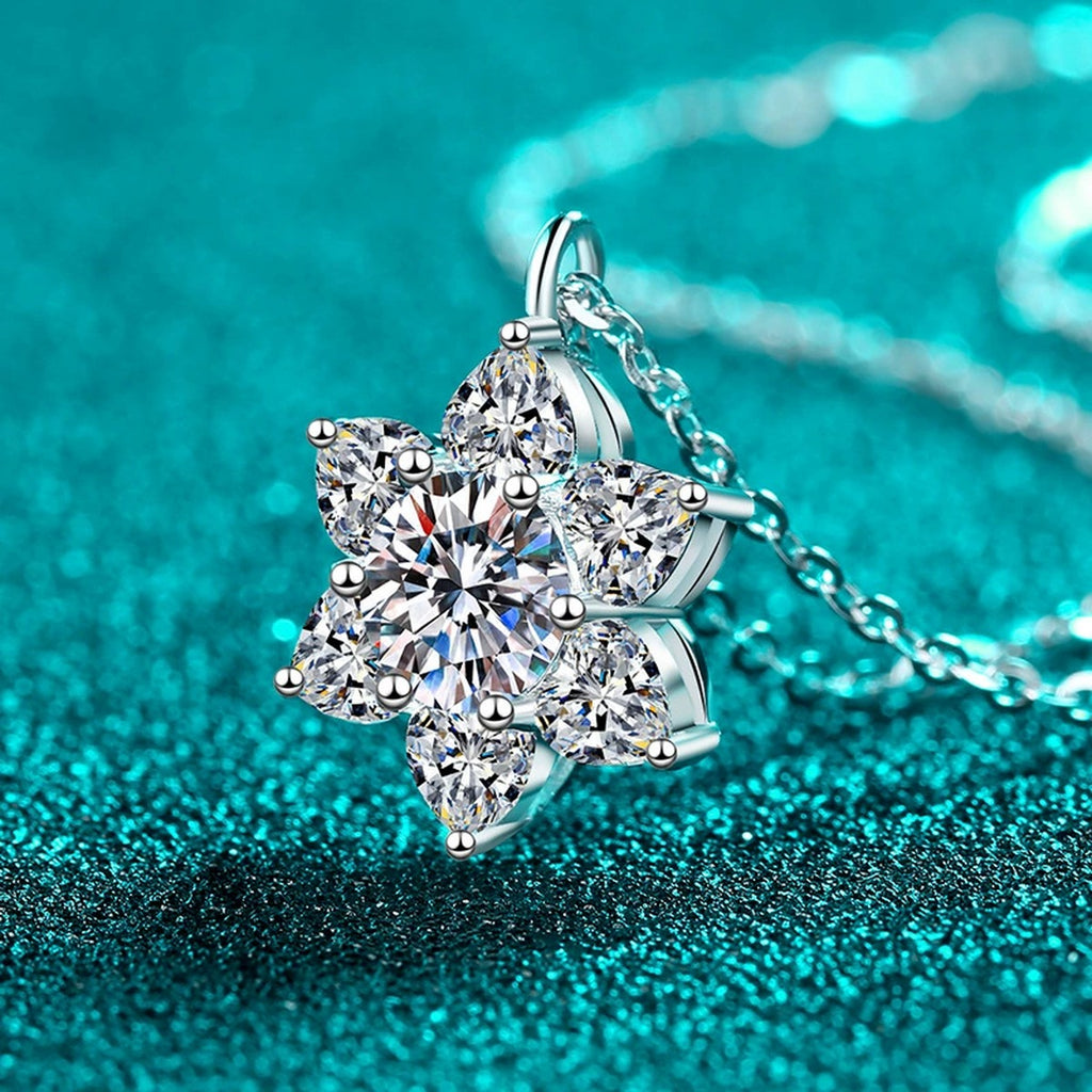 Sunflower Heart and Round Moissanite Pendant Necklace in Rhodium-Plated S925 sterling silver blue display scene showing chain and stone layout
