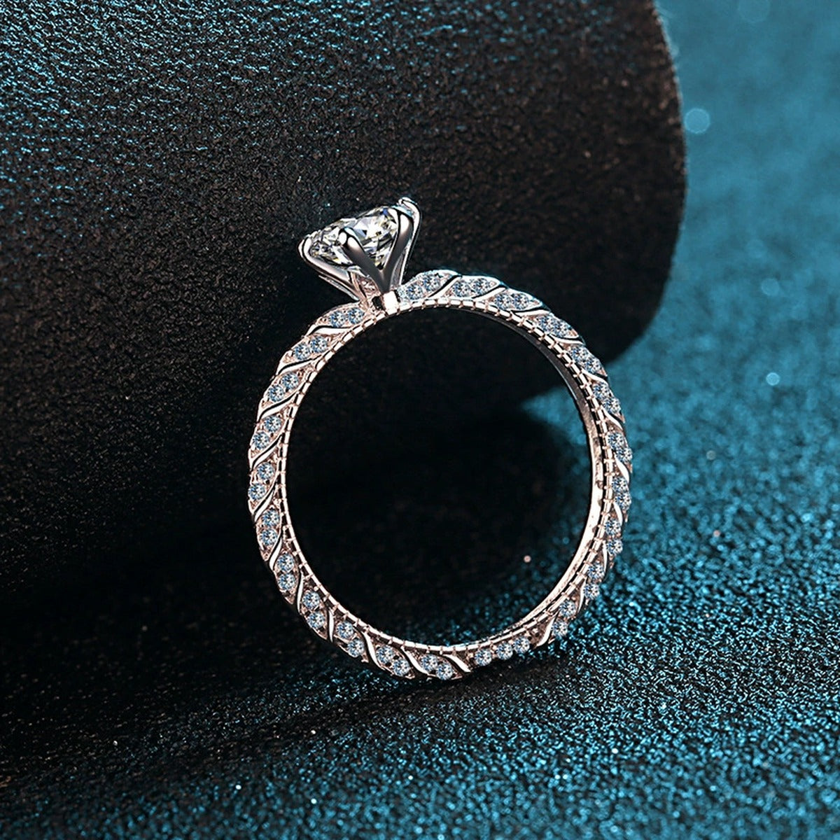 Round Moissanite Twist Engagement Ring with CZ product view showing moissanite setting and metal finish