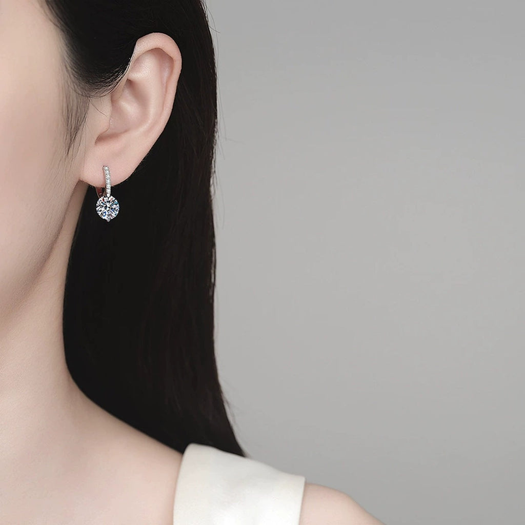 Round Moissanite Hoop Drop Earrings with CZ in Rhodium-Plated S925 sterling silver worn on ear by model showing scale, placement, and hoop drop earrings styling
