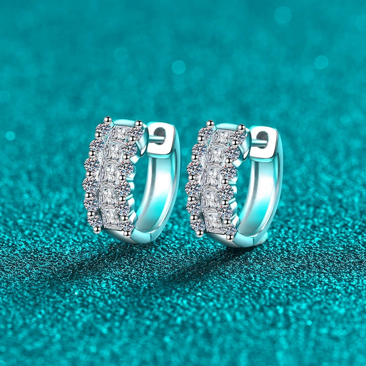 Round and Princess Cut Moissanite Huggie Hoop Earrings in Rhodium-Plated S925 sterling silver product scene view showing front sparkle