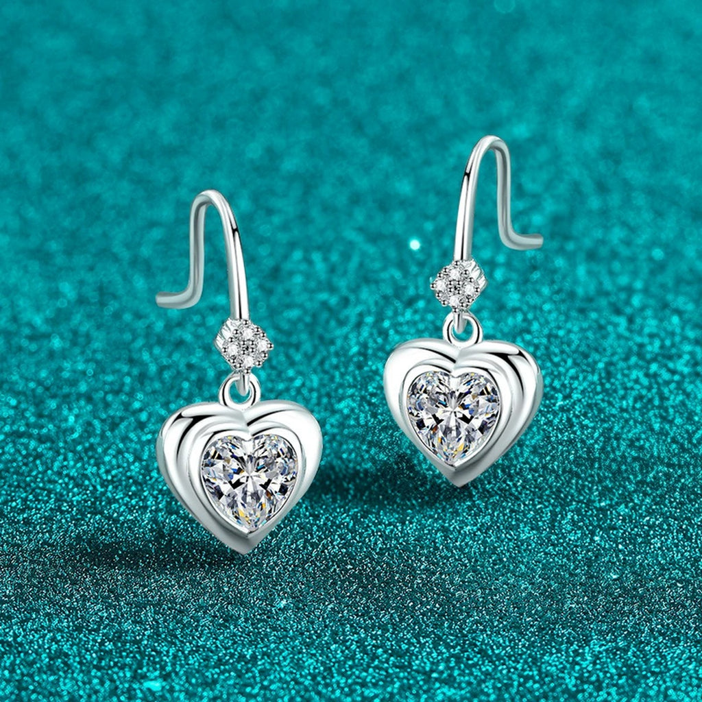 Heart Moissanite Hook Dangle Earrings in Rhodium-Plated S925 sterling silver product scene view showing angled setting detail