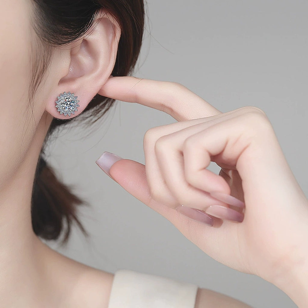 Floral Halo Moissanite Stud Earrings with CZ in Rhodium-Plated S925 sterling silver worn on ear by model showing scale, placement, and stud earrings styling