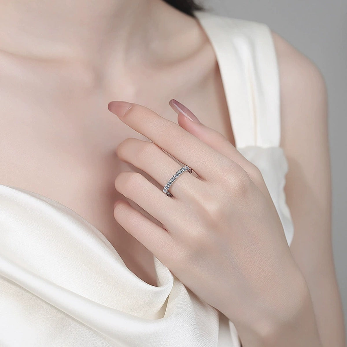Round Moissanite Band Ring worn on hand to show scale, band width, and ring profile