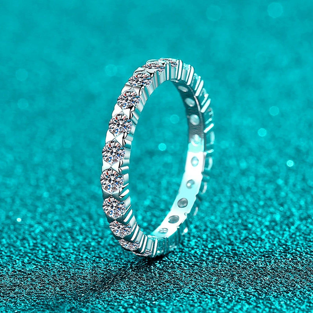Round Moissanite Band Ring product view showing moissanite setting and metal finish