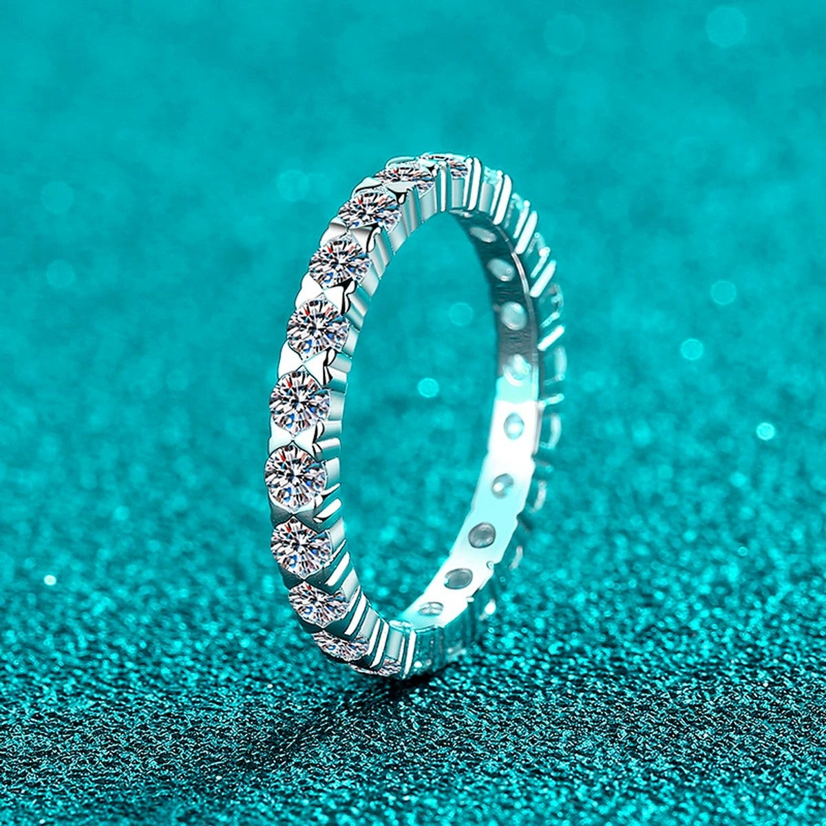 Round Moissanite Band Ring product view showing moissanite setting and metal finish