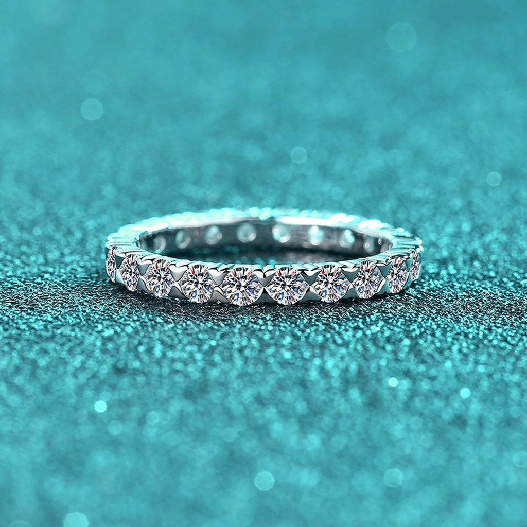 Round Moissanite Band Ring product view showing moissanite setting and metal finish