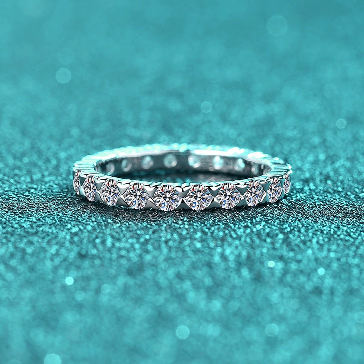 Round Moissanite Band Ring product view showing moissanite setting and metal finish