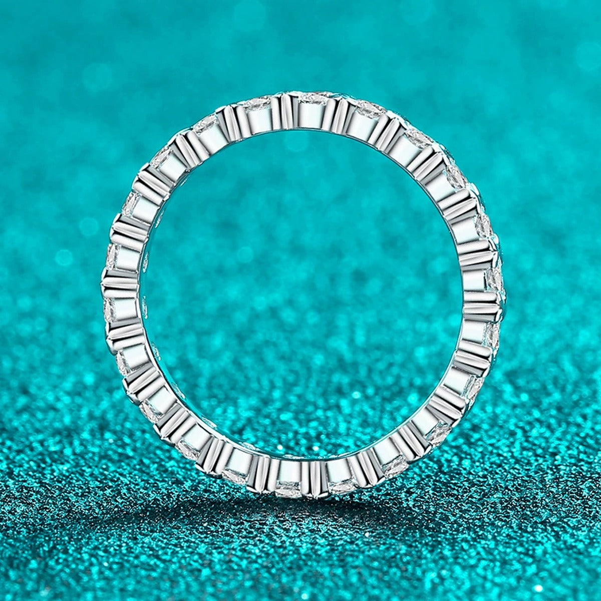 Round Moissanite Band Ring product view showing moissanite setting and metal finish