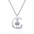 Dancing Moon Moissanite Pendant Necklace in Rhodium-Plated S925 sterling silver white background product photo showing crescent moon pendant with a moving round moissanite center