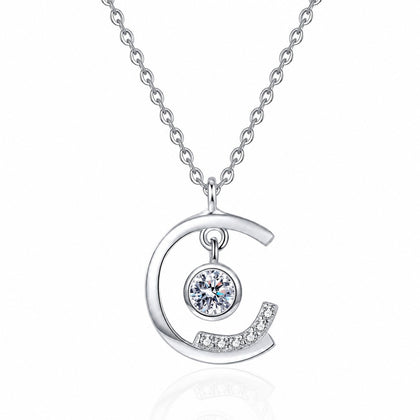 Dancing Moon Moissanite Pendant Necklace in Rhodium-Plated S925 sterling silver white background product photo showing crescent moon pendant with a moving round moissanite center