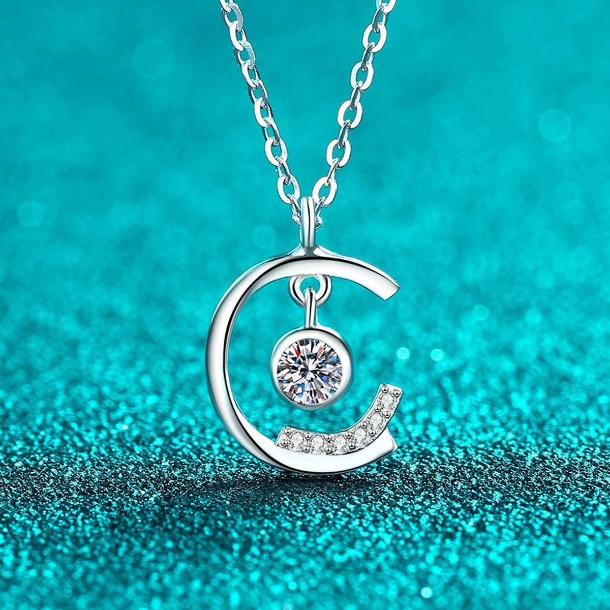 Dancing Moon Moissanite Pendant Necklace in Rhodium-Plated S925 sterling silver angled product detail view