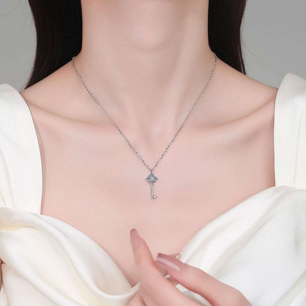 Star Key Moissanite Pendant Necklace in Rhodium-Plated S925 sterling silver neckline model view showing pendant scale and adjustable chain