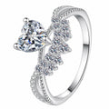 Heart Cut Moissanite Ring with CZ in rhodium-plated S925 sterling silver on clean white background