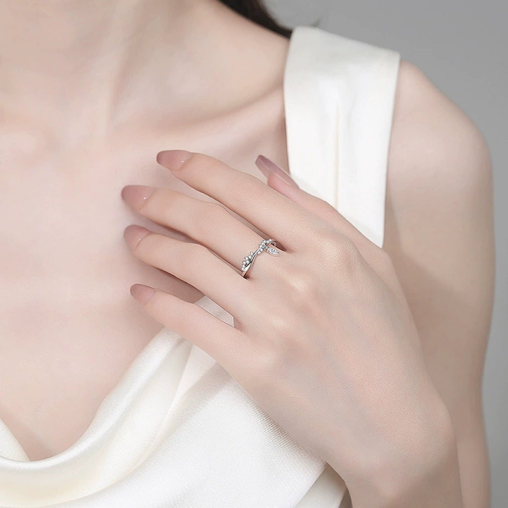 Marquise and Round Moissanite Band Ring worn on hand to show scale, band width, and ring profile