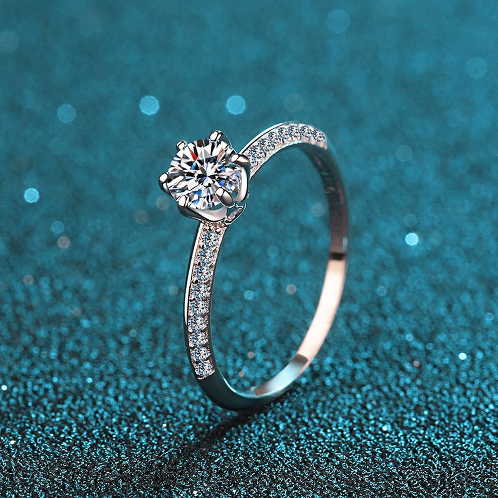 Round Moissanite Side Stone Engagement Ring with CZ product view showing moissanite setting and metal finish