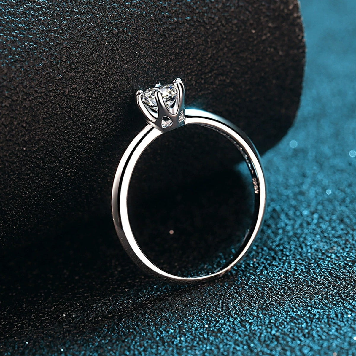 Round Moissanite Side Stone Engagement Ring with CZ product view showing moissanite setting and metal finish
