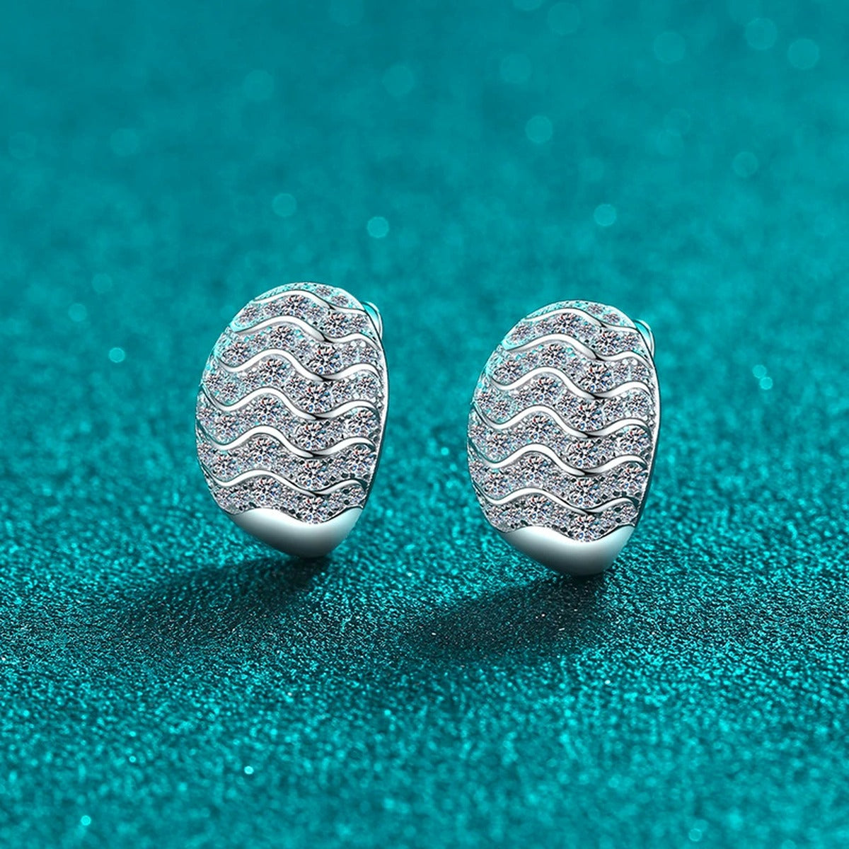 Wave Pave Moissanite Huggie Hoop Earrings in Rhodium-Plated S925 sterling silver product scene view showing front sparkle