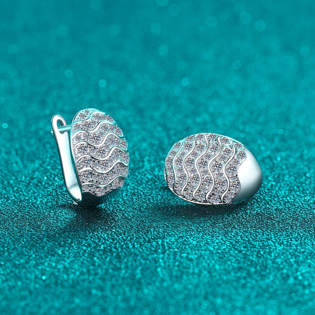 Wave Pave Moissanite Huggie Hoop Earrings in Rhodium-Plated S925 sterling silver product scene view showing angled setting detail