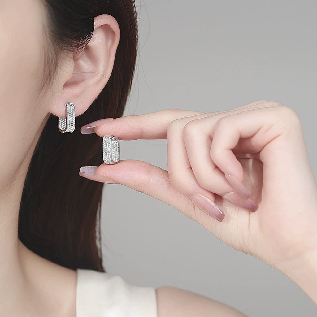 Rectangle Pave Moissanite Hoop Earrings in Rhodium-Plated S925 sterling silver worn on ear by model showing scale, placement, and hoop earrings styling