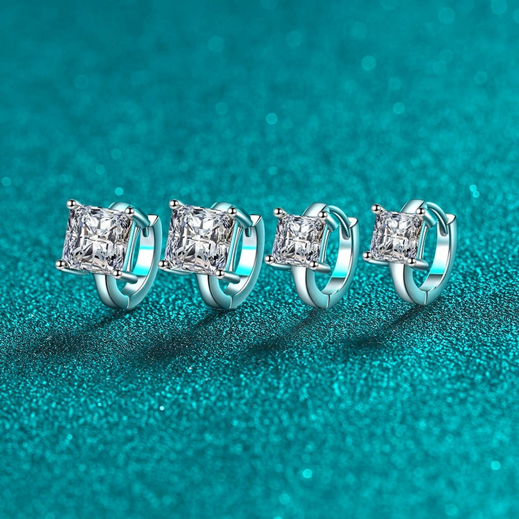 Princess Cut Moissanite Huggie Hoop Earrings in Rhodium-Plated S925 sterling silver product scene view showing angled setting detail